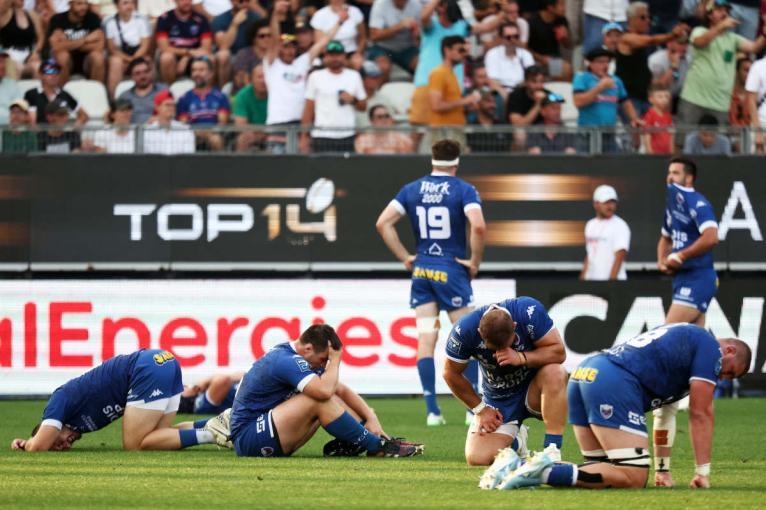 Dejected Grenoble players