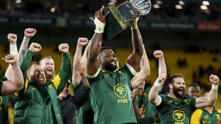 Siya Kolisi of South Africa celebrates with the Freedom Cup after winning The <a href=