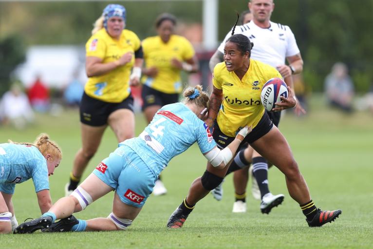 Ayesha Leti-I'iga of the Hurricanes Poua is tackled during the round four Super Rugby Aupiki match between Hurricanes Poua and Matatu