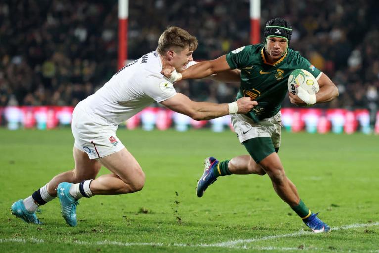 Tommy Freeman tackles Kurt-Lee Arendse