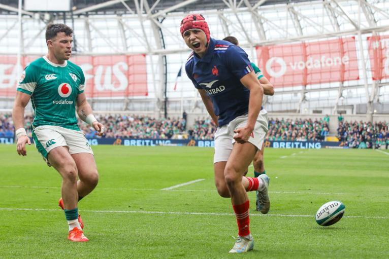 Louis Bielle-Biarrey celebrates scoring a try against Ireland