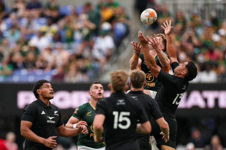 Ethan Hooker wins a high ball against New Zealand