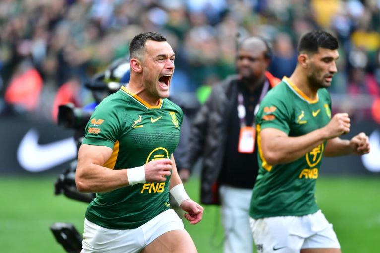 Jesse Kriel celebrates with Damian de Allende