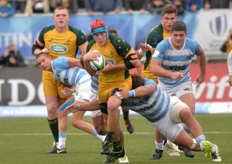 Fraser McReight carries the ball for Australia U20s in 2019, as Angus Bell looks on