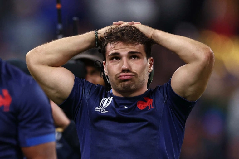 Antoine Dupont looks dejected after France's RWC23 quarter-final loss to South Africa