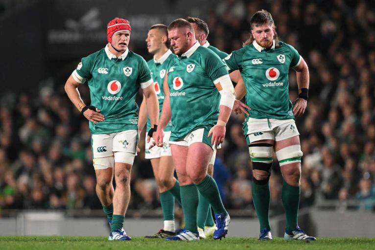 Josh van der Flier, Tadhg Furlong and Joe McCarthy look dejected