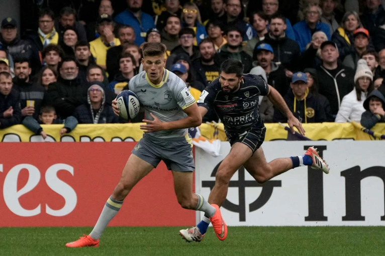 Sam Prendergast evades a tackle against Clermont