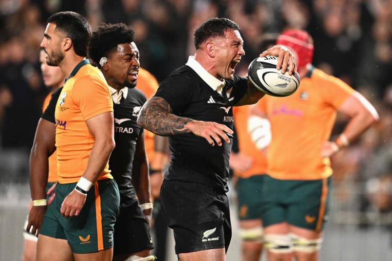 Codie Taylor celebrates scoring against Australia