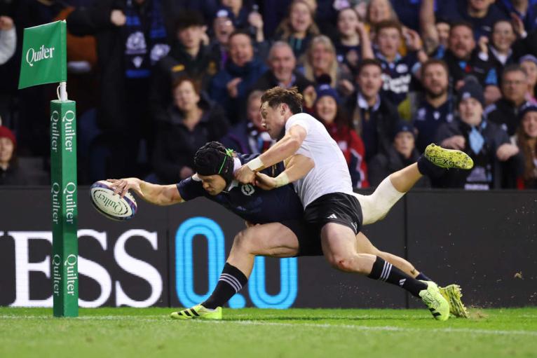 Darcy Graham is denied a try by Cam Roigard's tackle