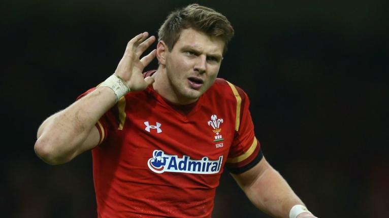 Dan Biggar listens