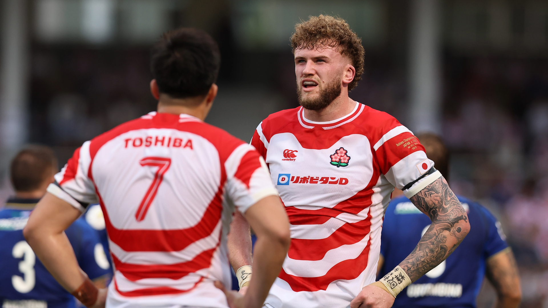 Warner Dearns talks with Kanji Shimokawa during Japan against Italy