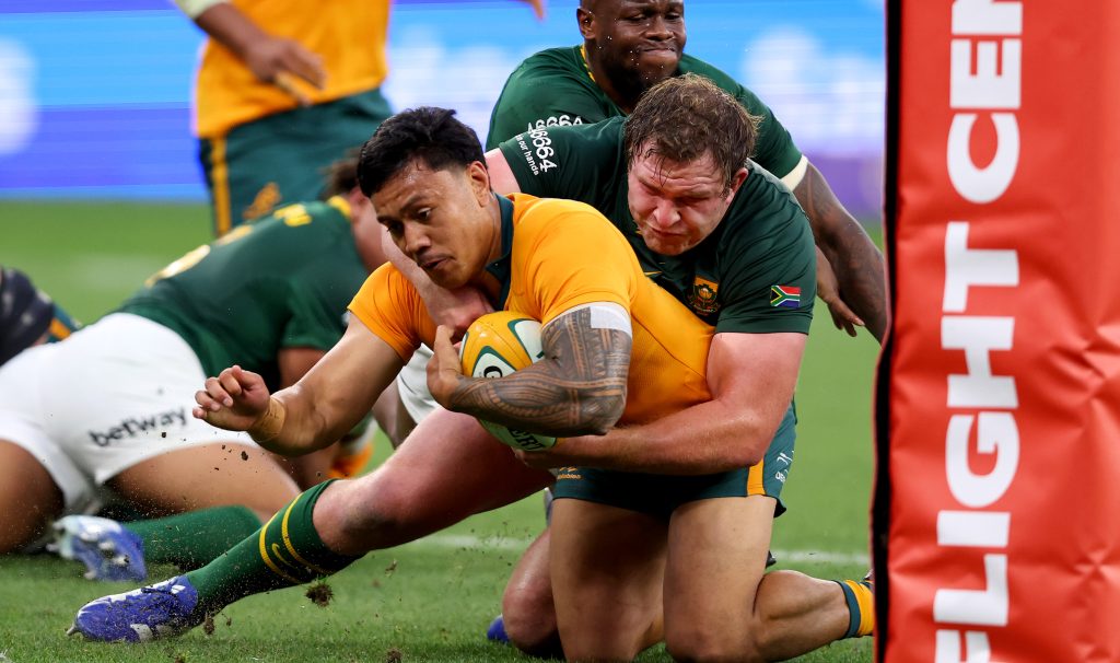 Len Ikitau stars as 11-man Wallabies survive incredible Springboks fightback